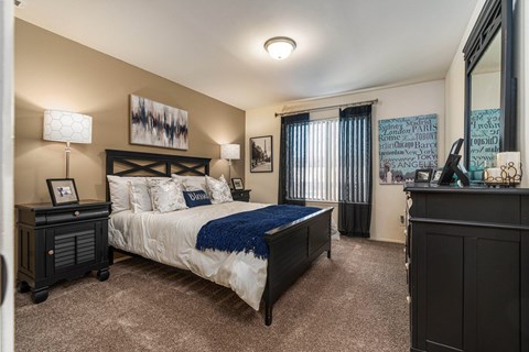 Spacious Bedroom with natural light at Knottingham Apartments in Clinton Township, MI